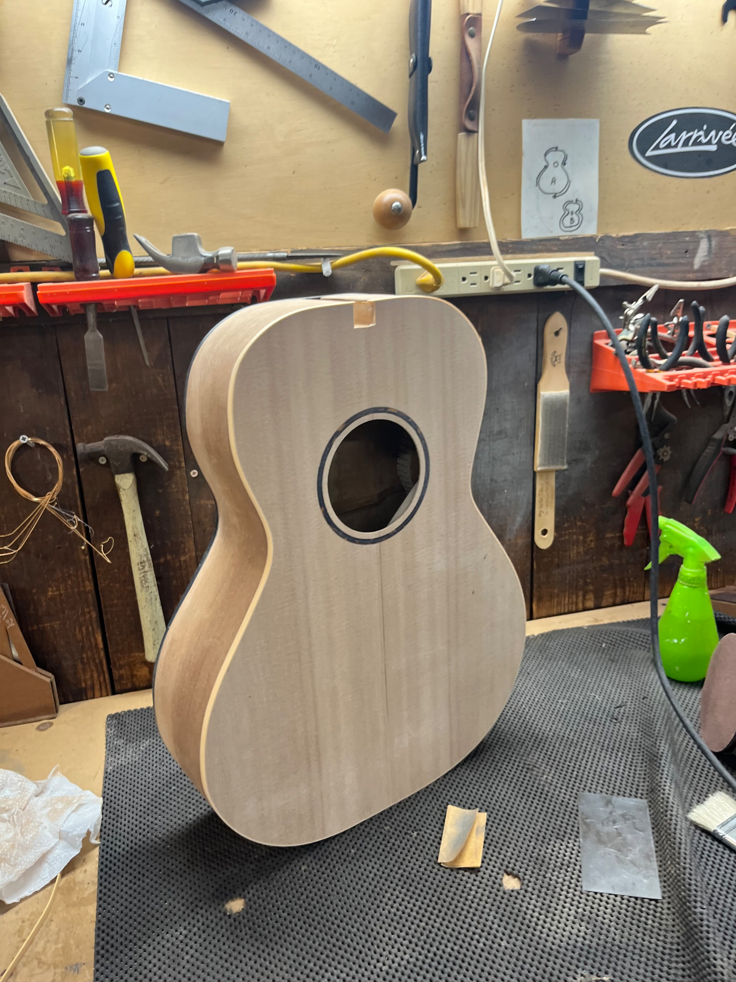 Smooth sanded spruce top standing on the workbench