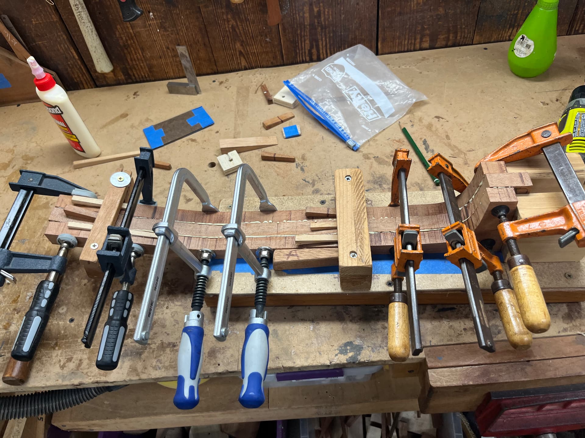 Neck pieces glued and clamped together on the workbench